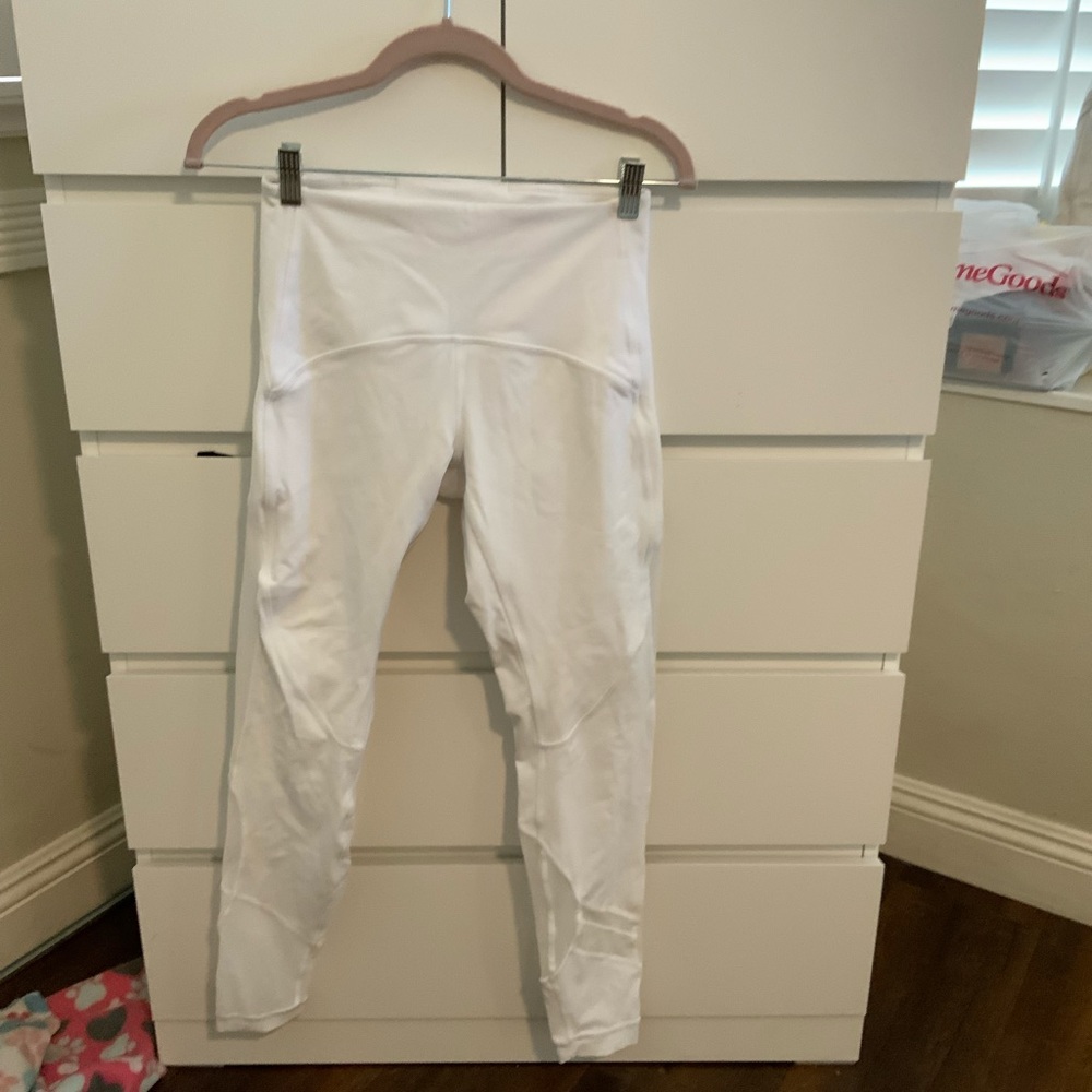 White Lululemon leggings.